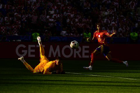 Spain's Lamine Yamal makes an attempt to score against Croatia